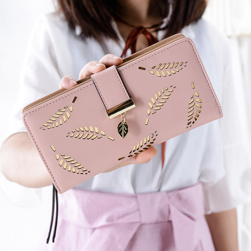 WOMEN'S WALLET WITH CUT-OUT DESIGN