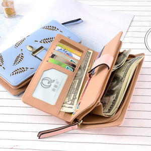 WOMEN'S WALLET WITH CUT-OUT DESIGN